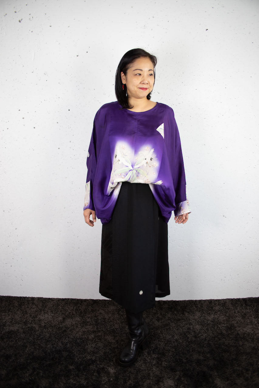 Long-sleeved shirt with purple auspicious crane design made from old clothes.