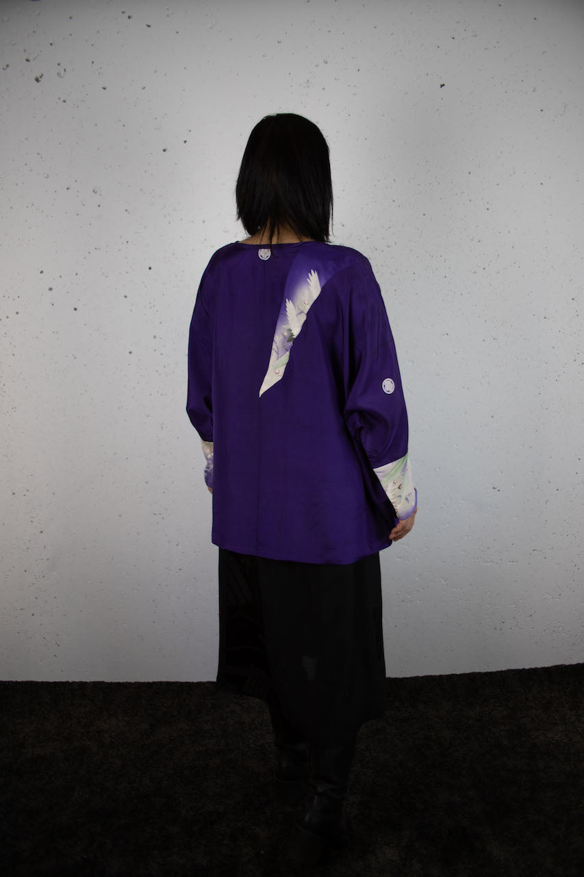 Long-sleeved shirt with purple auspicious crane design made from old clothes.
