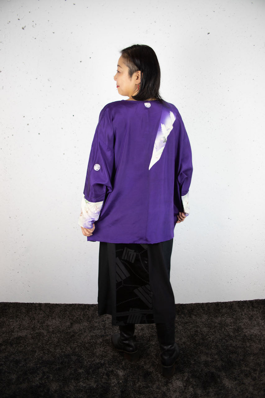 Long-sleeved shirt with purple auspicious crane design made from old clothes.