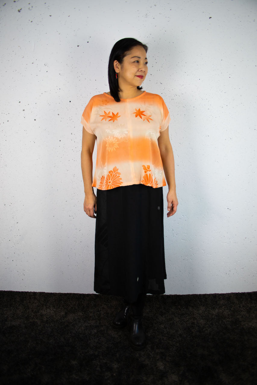Light-coloured short-sleeved shirts made from old clothing