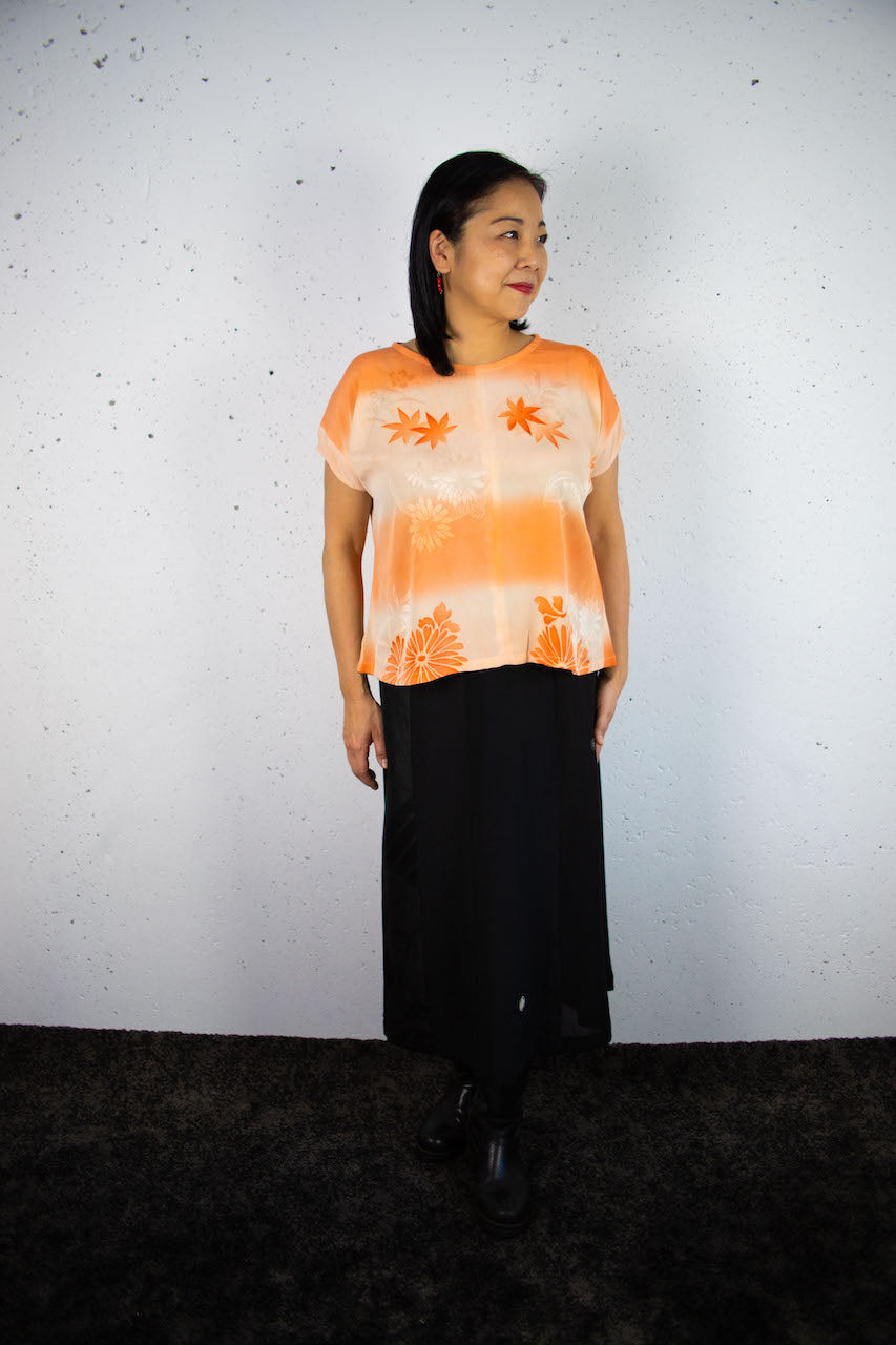 Light-coloured short-sleeved shirts made from old clothing