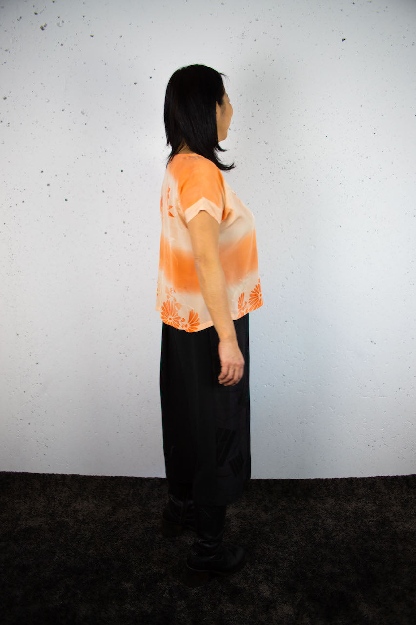 Light-coloured short-sleeved shirts made from old clothing