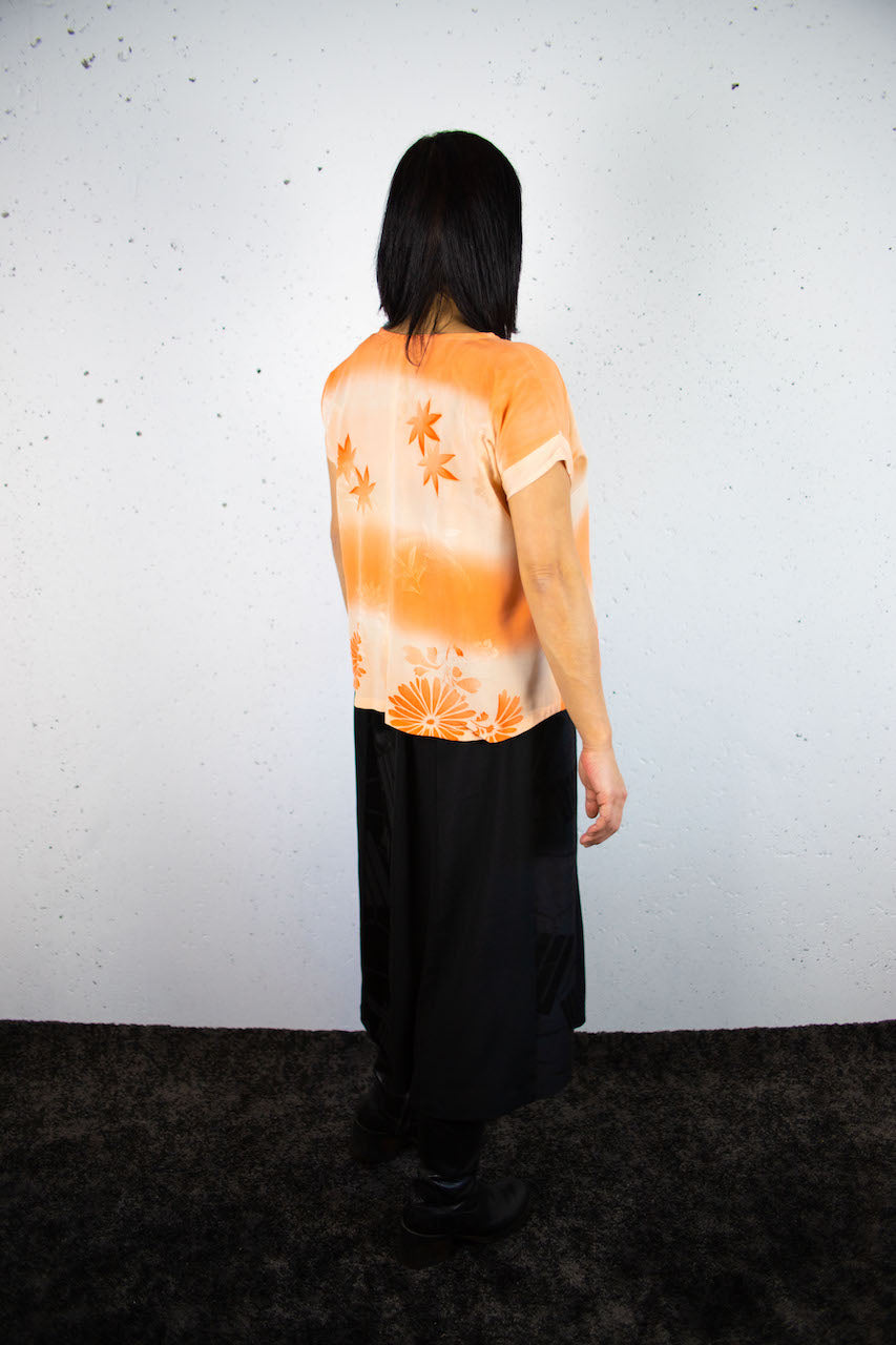 Light-coloured short-sleeved shirts made from old clothing