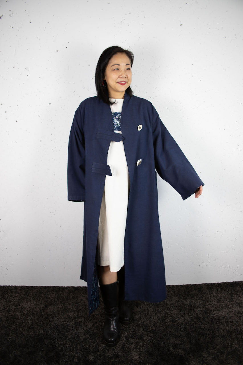 Elegant Indigo Coat: A Fusion of Tradition and Modern Functionality