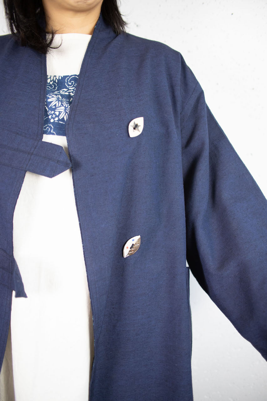 Elegant Indigo Coat: A Fusion of Tradition and Modern Functionality