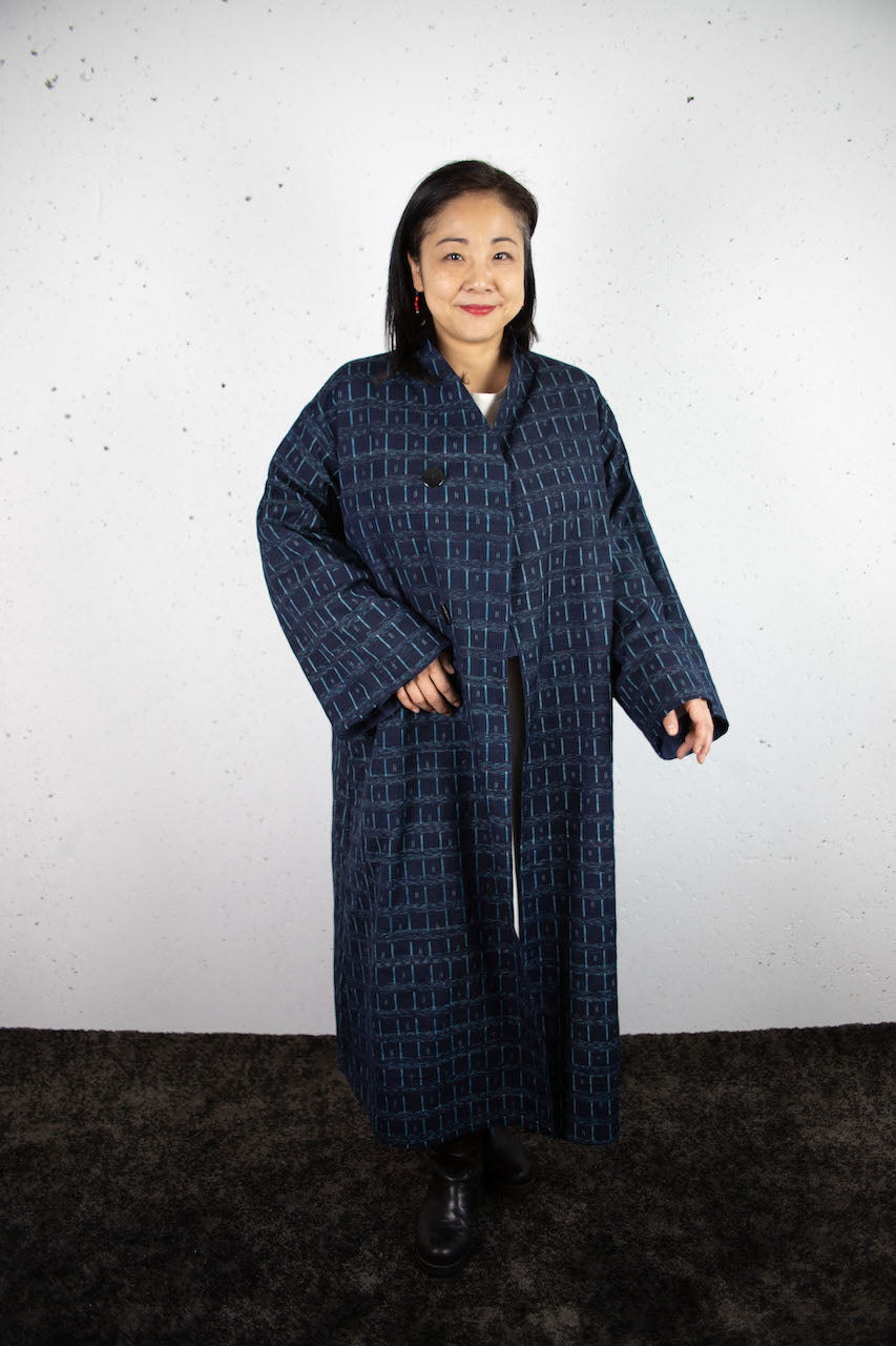 Elegant Indigo Coat: A Fusion of Tradition and Modern Functionality