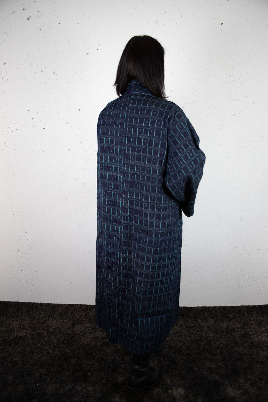 Elegant Indigo Coat: A Fusion of Tradition and Modern Functionality