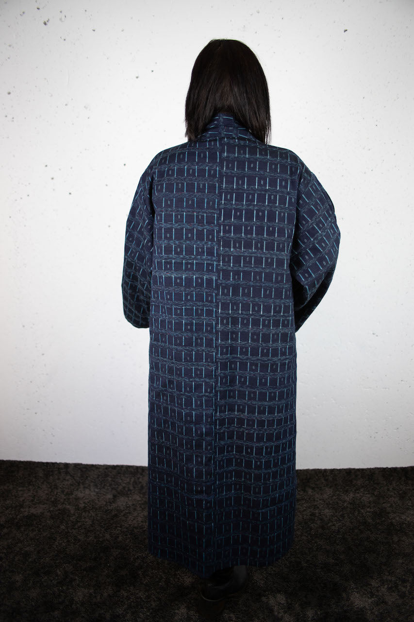 Elegant Indigo Coat: A Fusion of Tradition and Modern Functionality