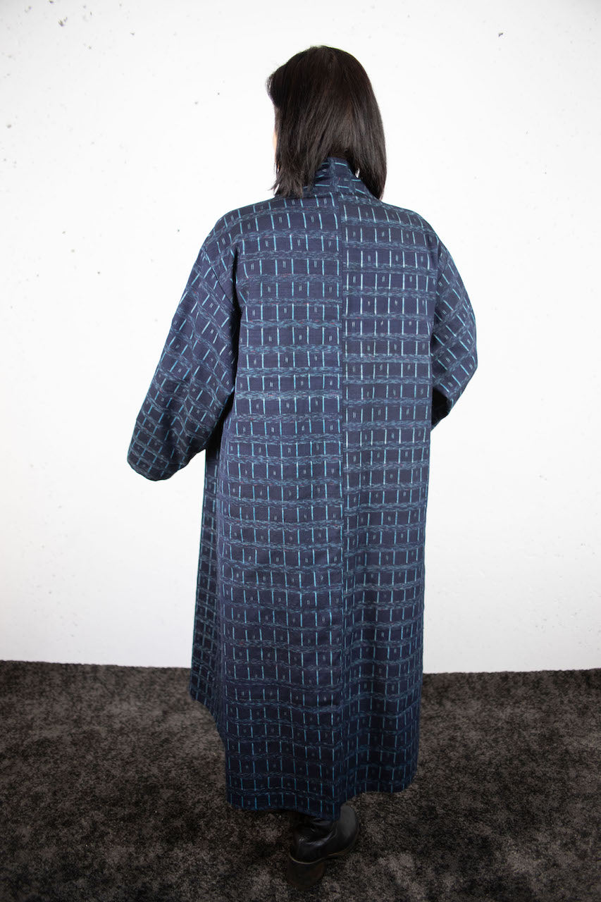 Elegant Indigo Coat: A Fusion of Tradition and Modern Functionality