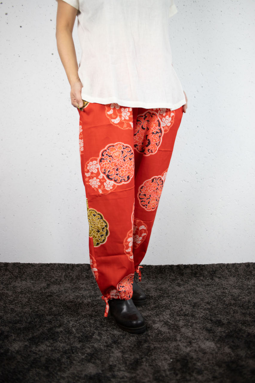 Momp trousers with tied hems made from muslin weave kimono.