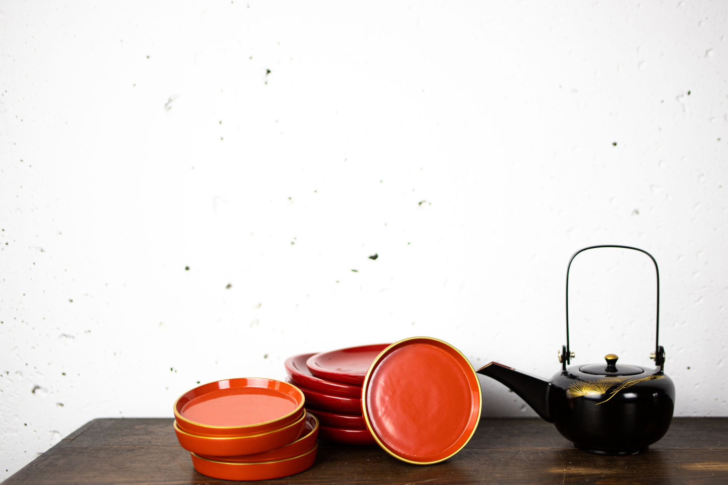 Lacquered sake bottle chokes for holding alcohol at weddings