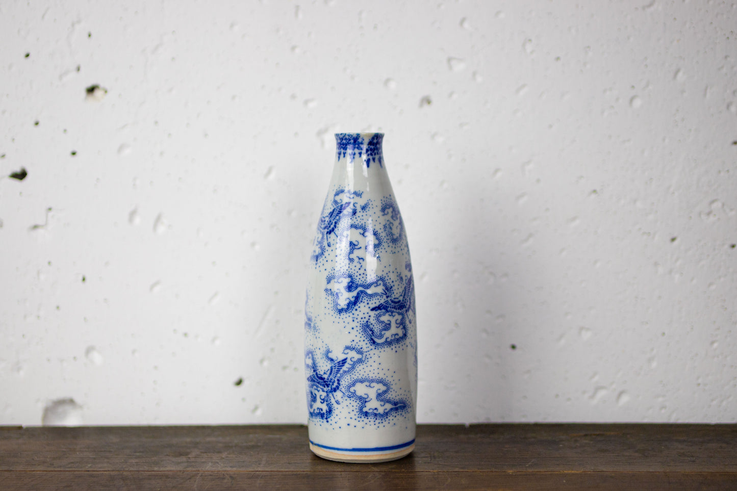 Large sake bottle with crane-patterned seal stamp