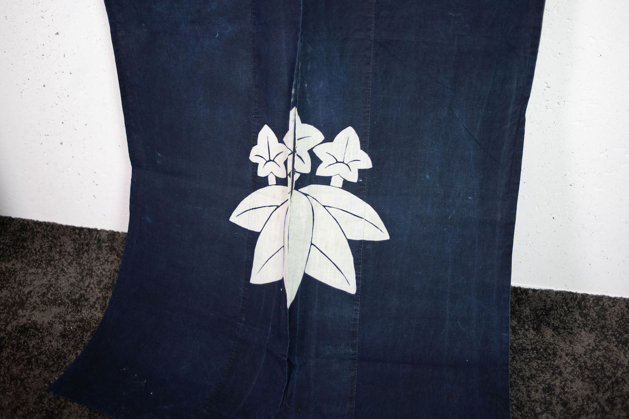 Handmade goodwill made of old indigo-dyed family crested flags and cover cloth.
