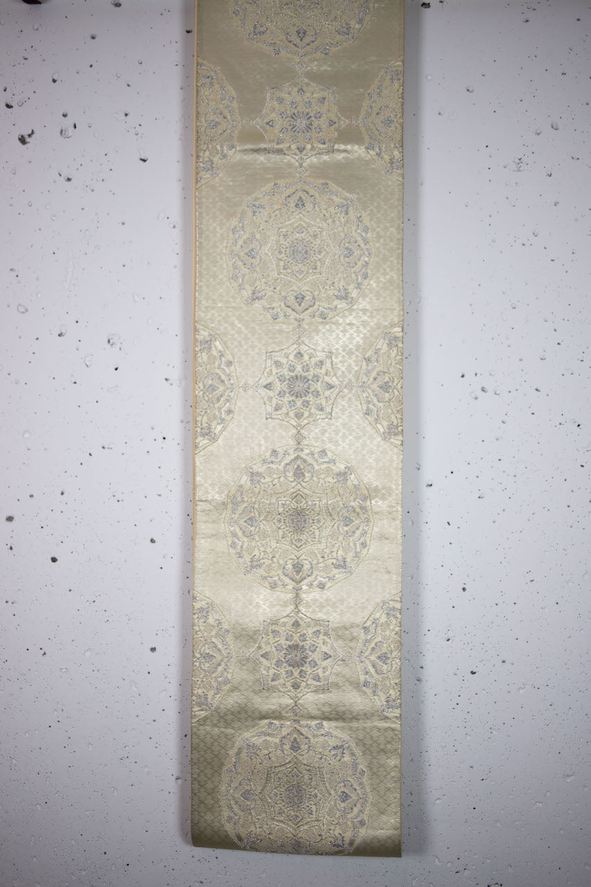 Precious obi with silver thread.