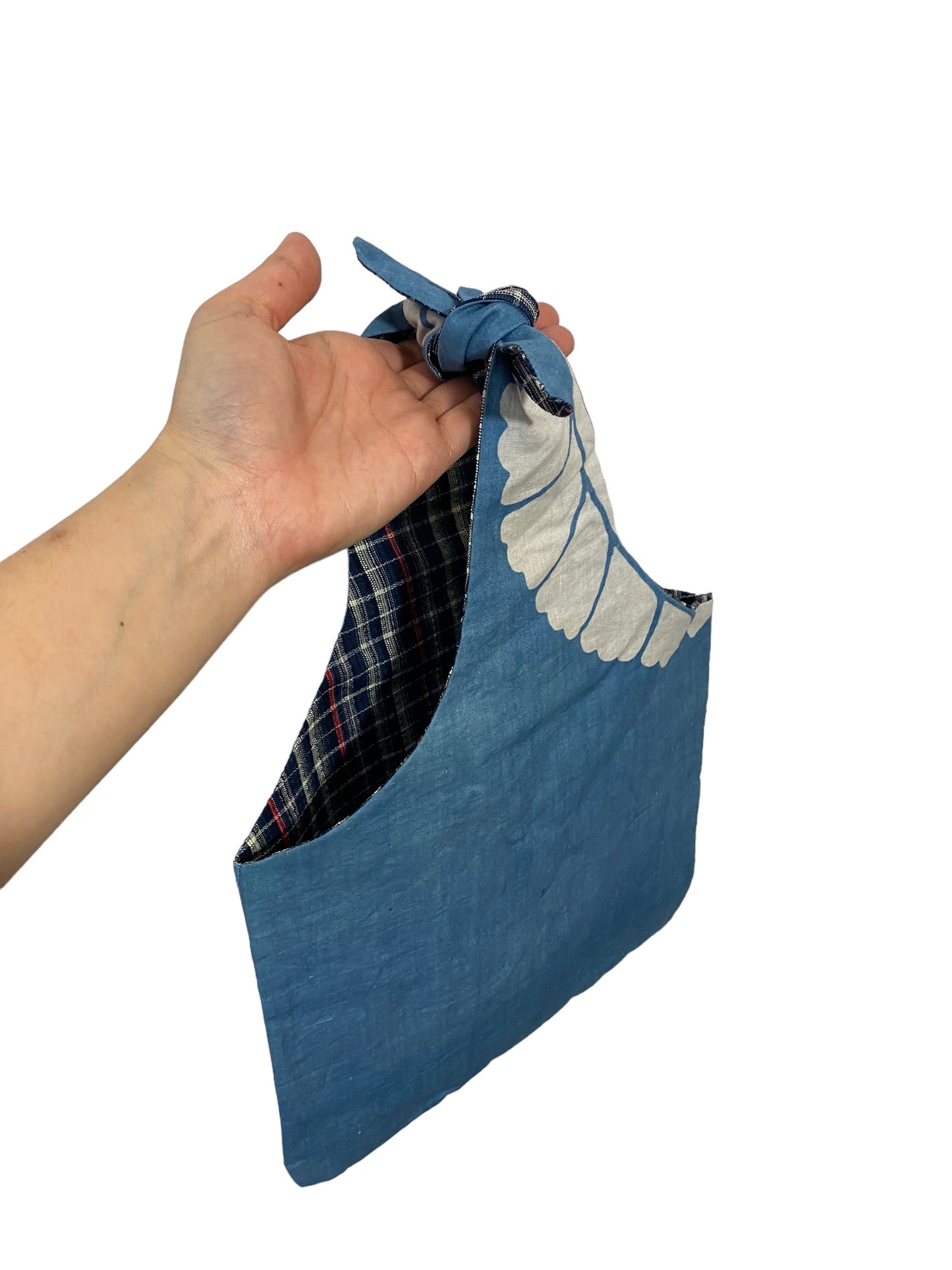 Idea bag that can be tied at the top to make a handbag.