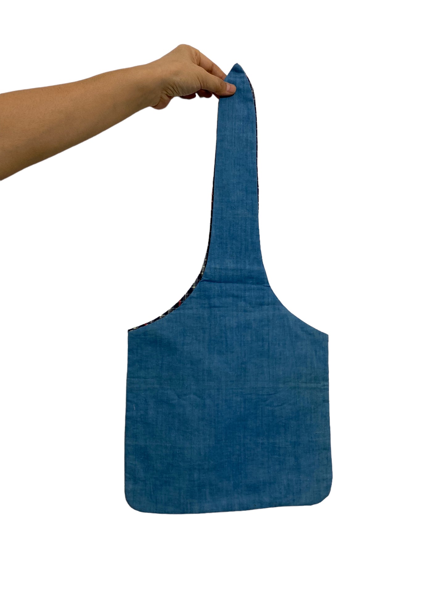 Idea bag that can be tied at the top to make a handbag.