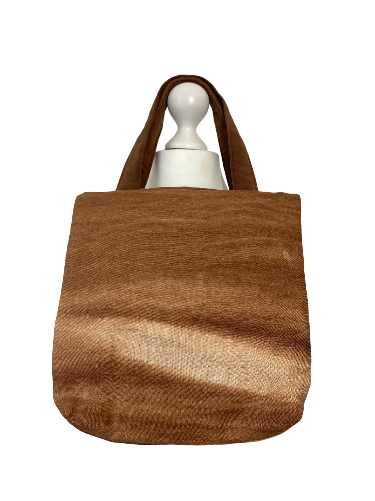 Persimmon-dyed handbag