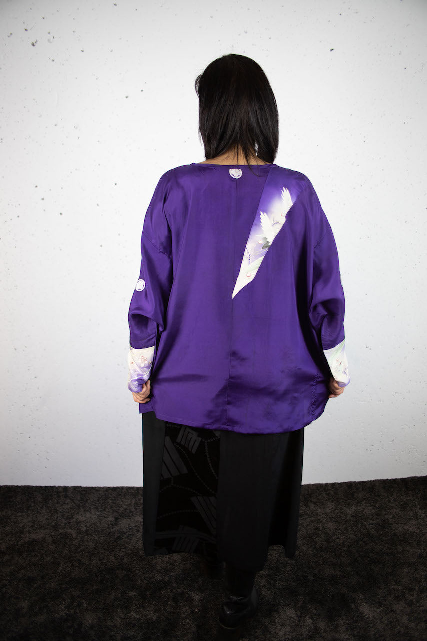 Long-sleeved shirt with purple auspicious crane design made from old clothes.