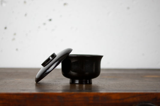 black lacquered bowl