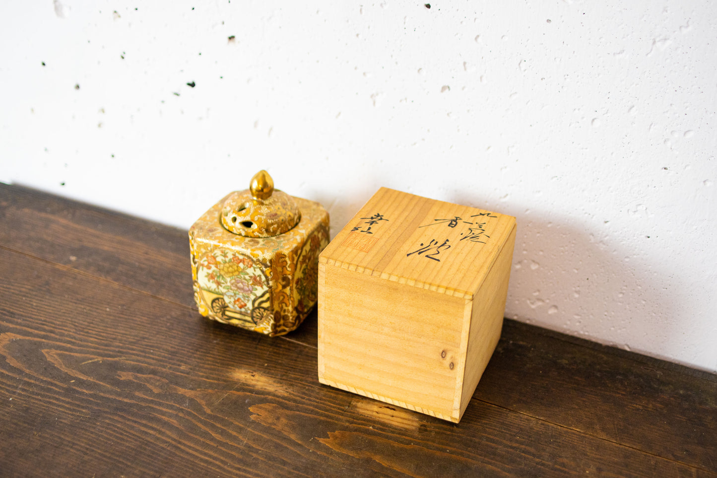 Kutani ware incense burner in wooden box.