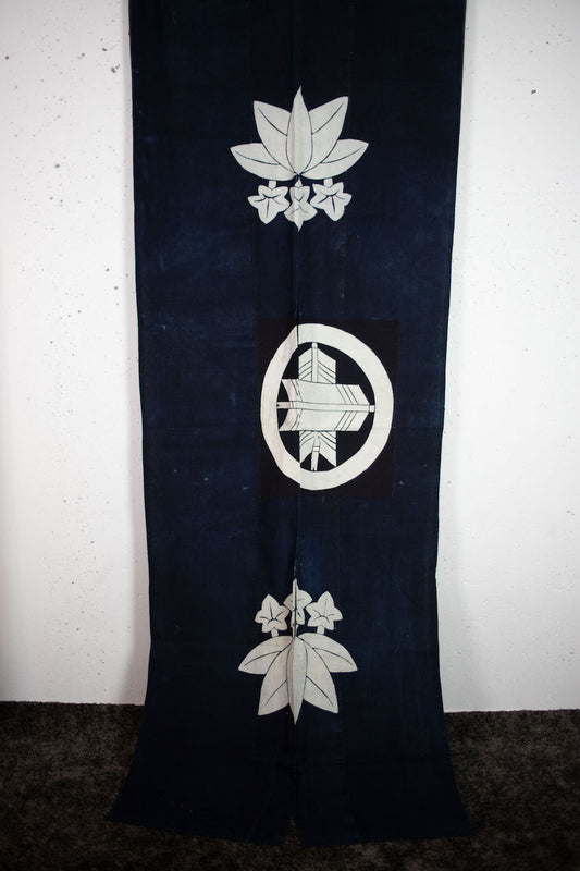 Handmade goodwill made of old indigo-dyed family crested flags and cover cloth.
